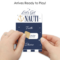 Close up of perforated tabs on nautical game card