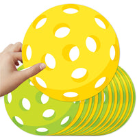 A set of large, yellow and green pickleball-shaped paper cut-outs, with a hand holding one of the yellow cut-outs.