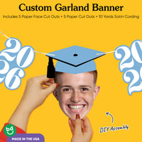 Graduation face cutout with cap and light blue 2026 number