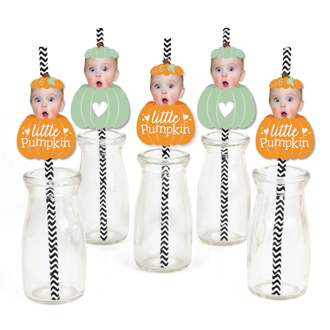 Set of 24 paper straw decorations with 'Little Pumpkin' text and face cut-outs, striped paper straws, and clear stickers for a fall birthday party.
