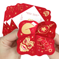 A person holding a red and gold colored fortune teller with Lunar New Year themed illustrations, including Chinese lanterns and a dragon.