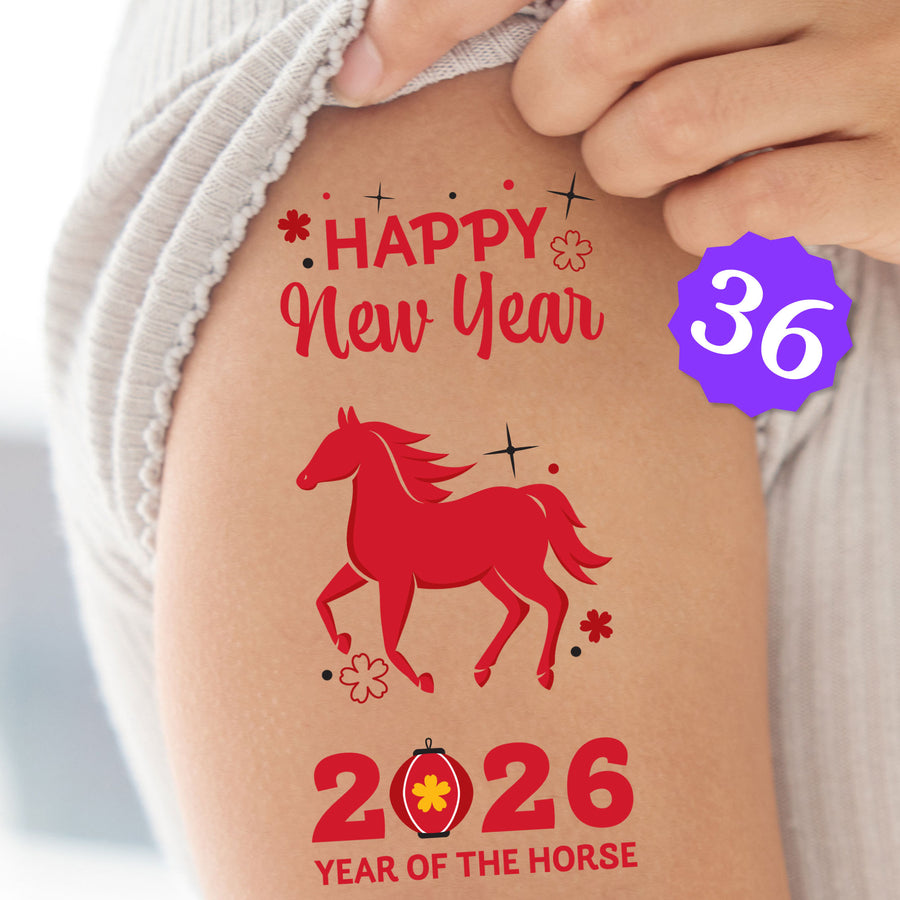 Tattoo of a red horse with 'Happy New Year 2026 Year of the Horse' text on skin, with a hand holding it.