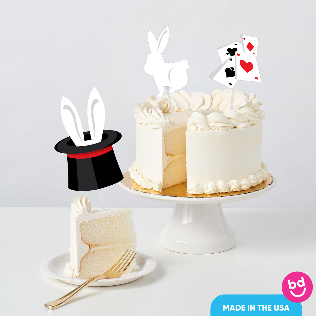 kids magic themed party cake with topper decorations