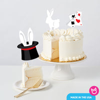 kids magic themed party cake with topper decorations