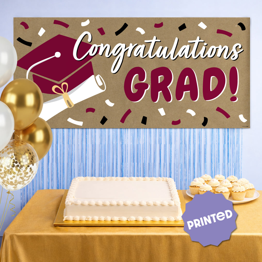 Maroon graduation banner hanging at party