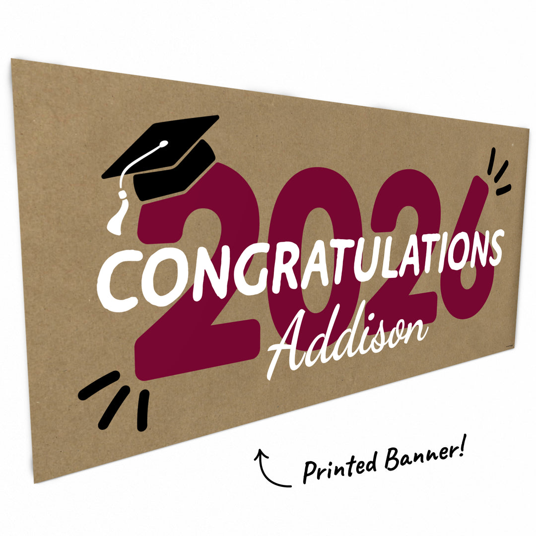 Maroon 2026 graduation banner close-up on kraft paper