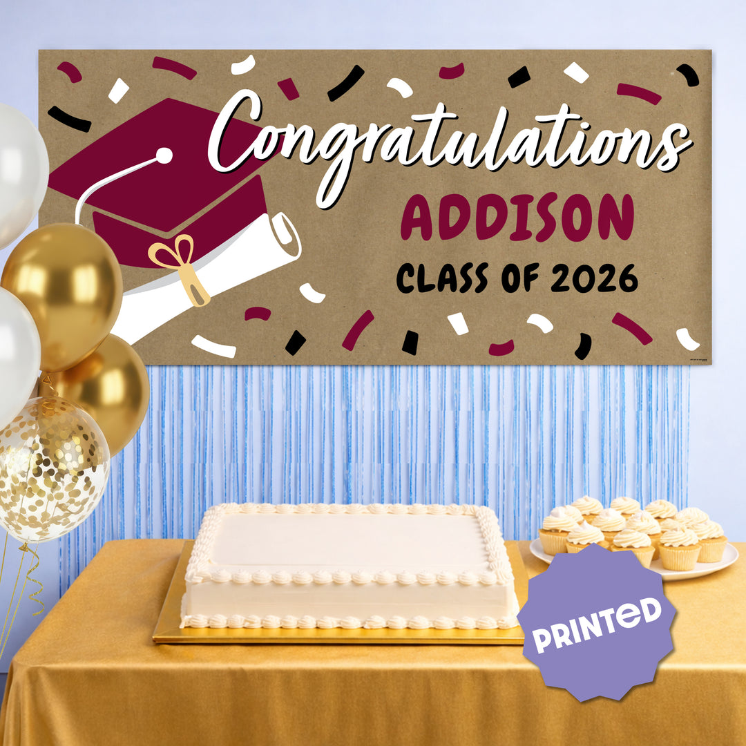 Maroon graduation banner displayed at party