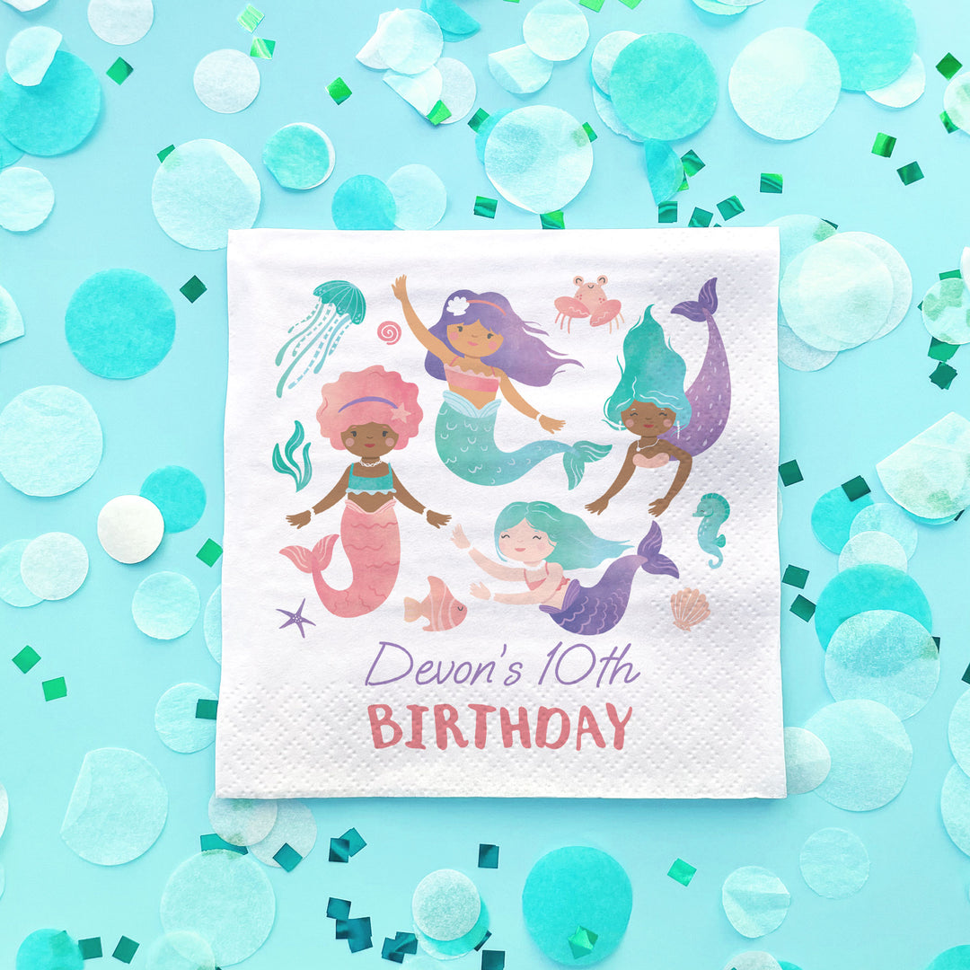 Girl's Birthday napkin with mermaid design on a blue background with confetti