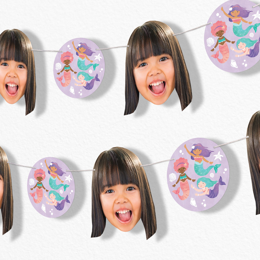 Children's custom face banner with mermaid designs on a white background