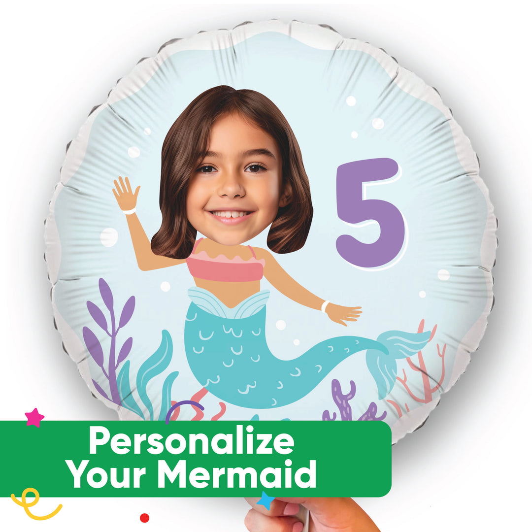 Round balloon with a custom photo mermaid design and number 5, featuring a child's face, on a light blue background.