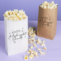 Two popcorn bags with 'Enjoy a Midnight Snack' text on a purple background