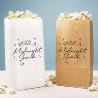 Two bags of popcorn, one white and one brown, with 'Enjoy a Midnight Snack' text on a light blue background.
