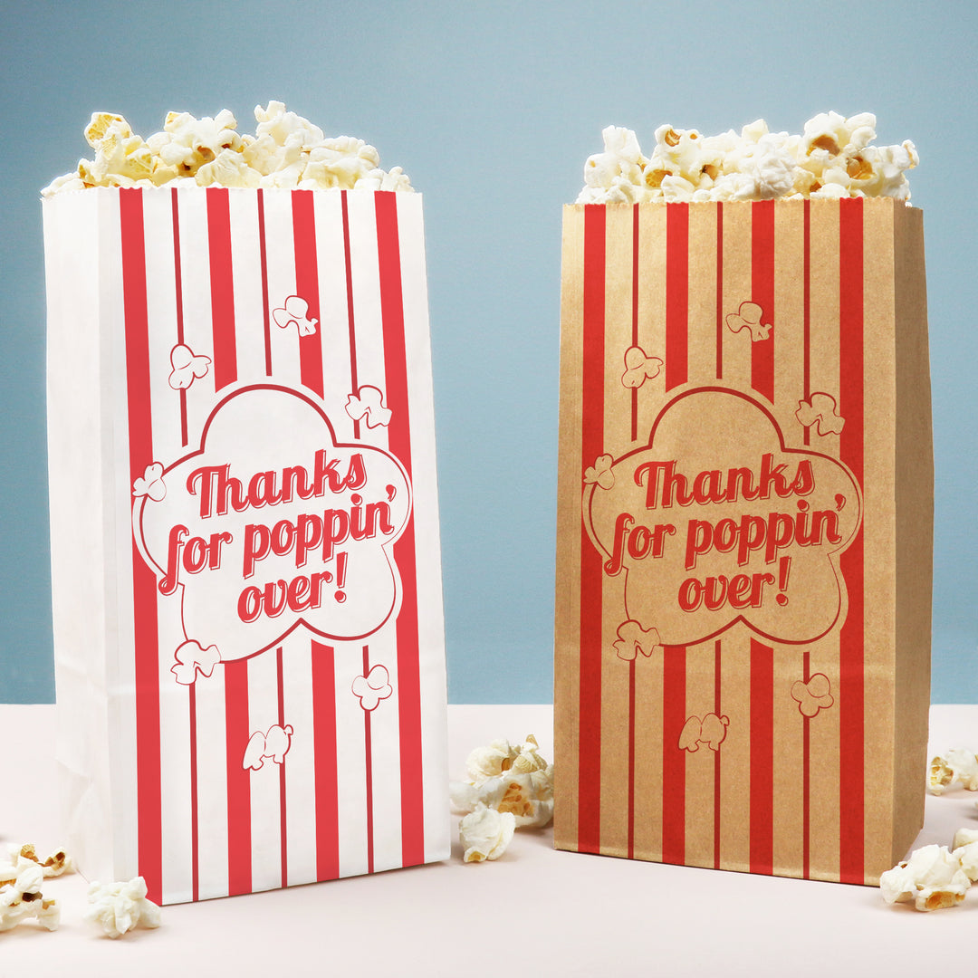 Two popcorn bags with red and white stripes and 'Thanks for poppin' over!' text on a light blue background.