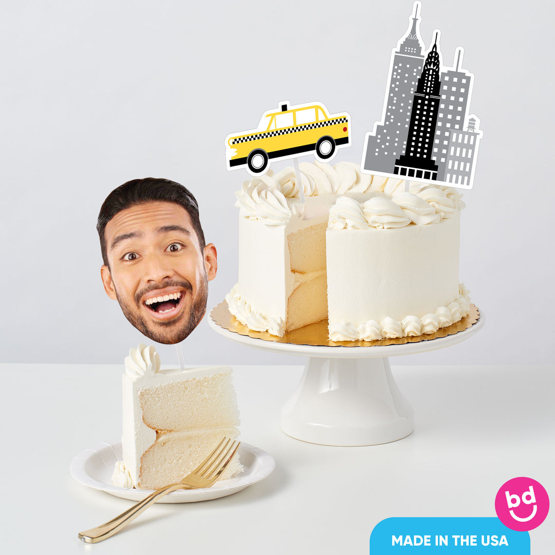 New York themed party cake with cityscape topper