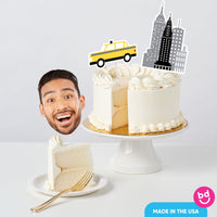 New York themed party cake with cityscape topper