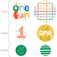Set of colorful 1st birthday circular confetti with birthday-themed designs and text.