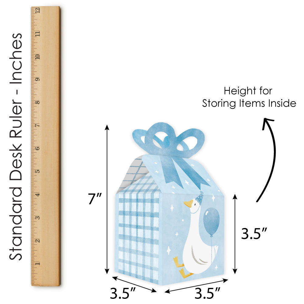 Measurement chart of a decorative box with a goose design, showing dimensions and a ruler for scale.