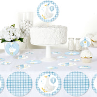 One Silly Goose blue confetti scattered on boy’s first birthday dessert table