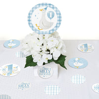 One Silly Goose blue confetti scattered on boy’s first birthday dessert table