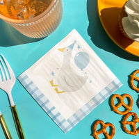 Boy’s silly goose birthday party table with matching napkins