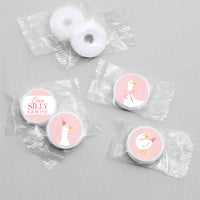 Small round stickers with 'One Silly Goose' design in clear packaging on a gray background