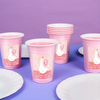 Pink silly goose first birthday party table with custom cups
