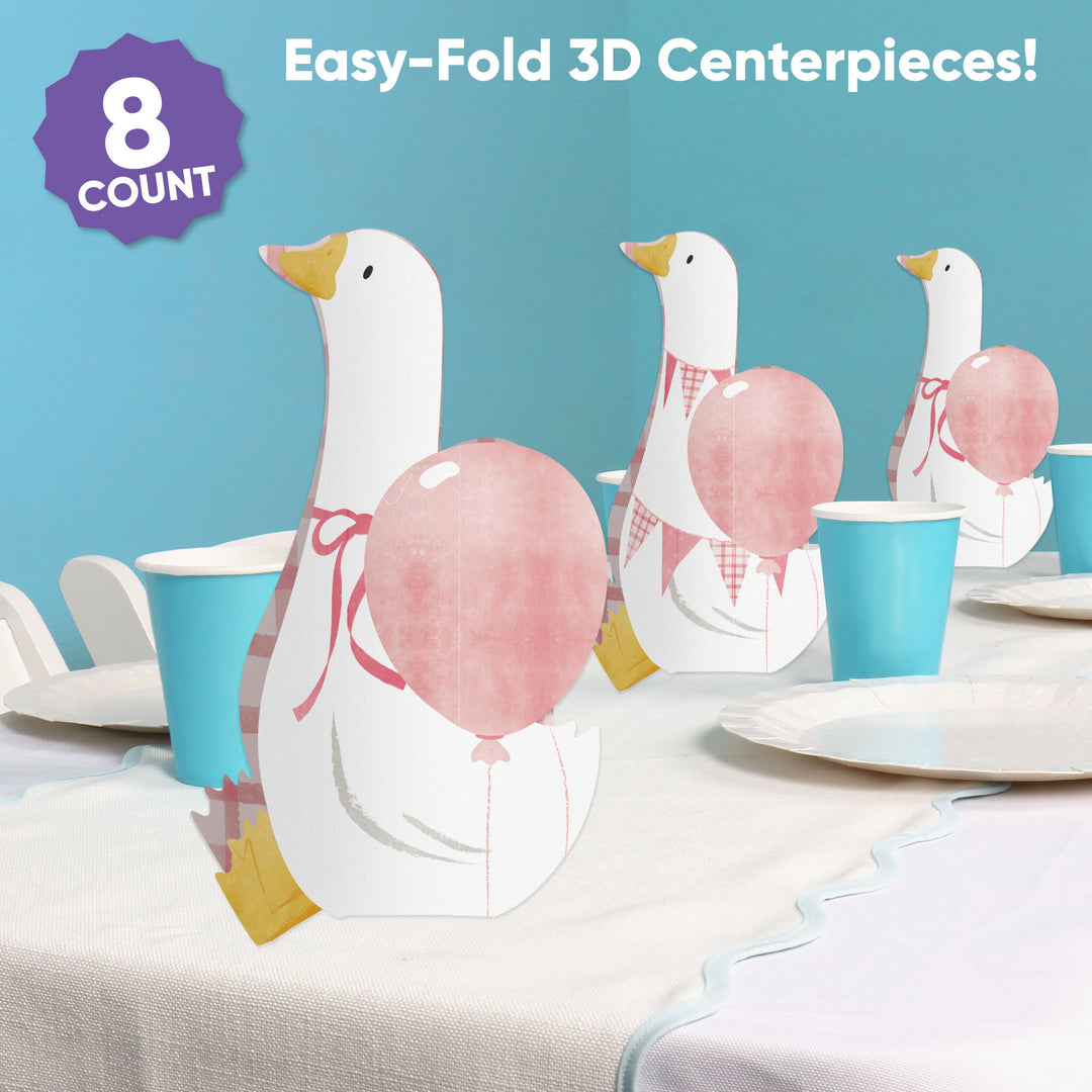 Pink One Silly Goose 3D table centerpieces displayed on a girl’s first birthday party table