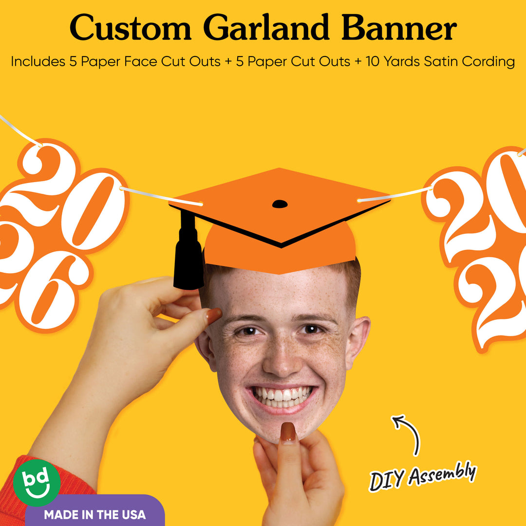 Graduation face cutout with cap and orange Class of 2026