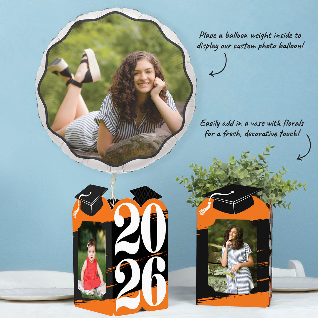 Orange graduation table decor with photo holder centerpieces