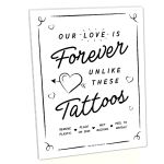 A black and white image of a temporary tattoo station sign with the text 'OUR LOVE IS Forever UNLIKE These Tattoos' along with instructions for applying the tattoos.