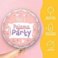 Pink balloon with 'Ava's Pajama Party' text held by a hand on a pink and yellow background.