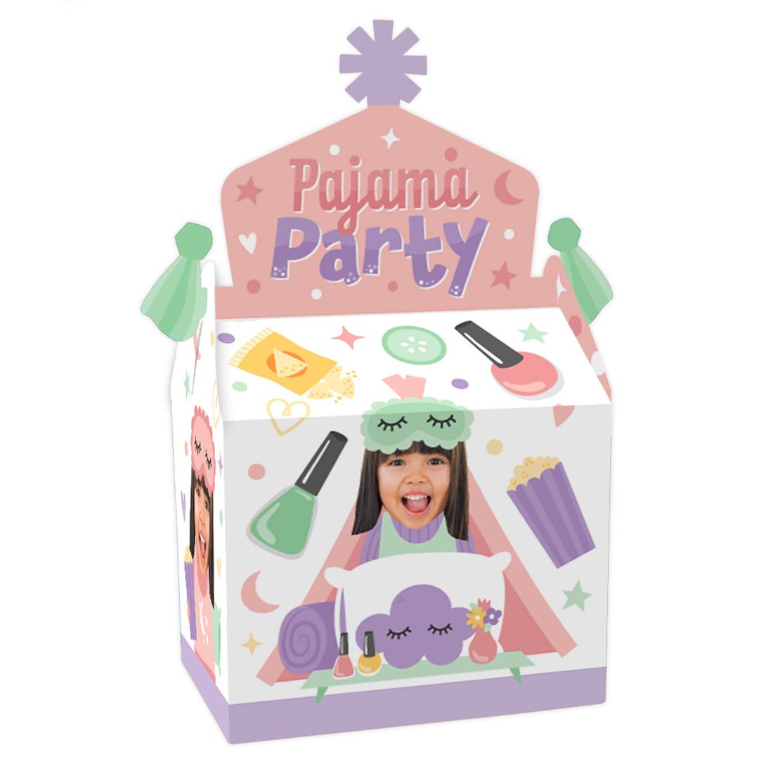 A set of 12 flat, cardstock party favor boxes for children's pajama slumber parties, with a space for a custom photo, illustrated with party-themed graphics like pillows, drinks, and makeup.