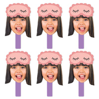 A set of six face cut-out paddles with a sleeping mask design, meant for photo props at a pajama slumber party.