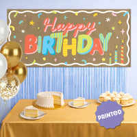 Birthday party setup with colorful kraft banner