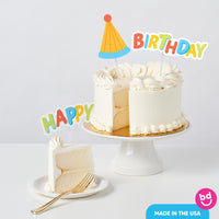 Birthday cake styled with Party Time toppers at celebration