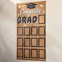 DIY Graduation photo booth backdrop with 'Congrats Grad' text and placeholder frames.