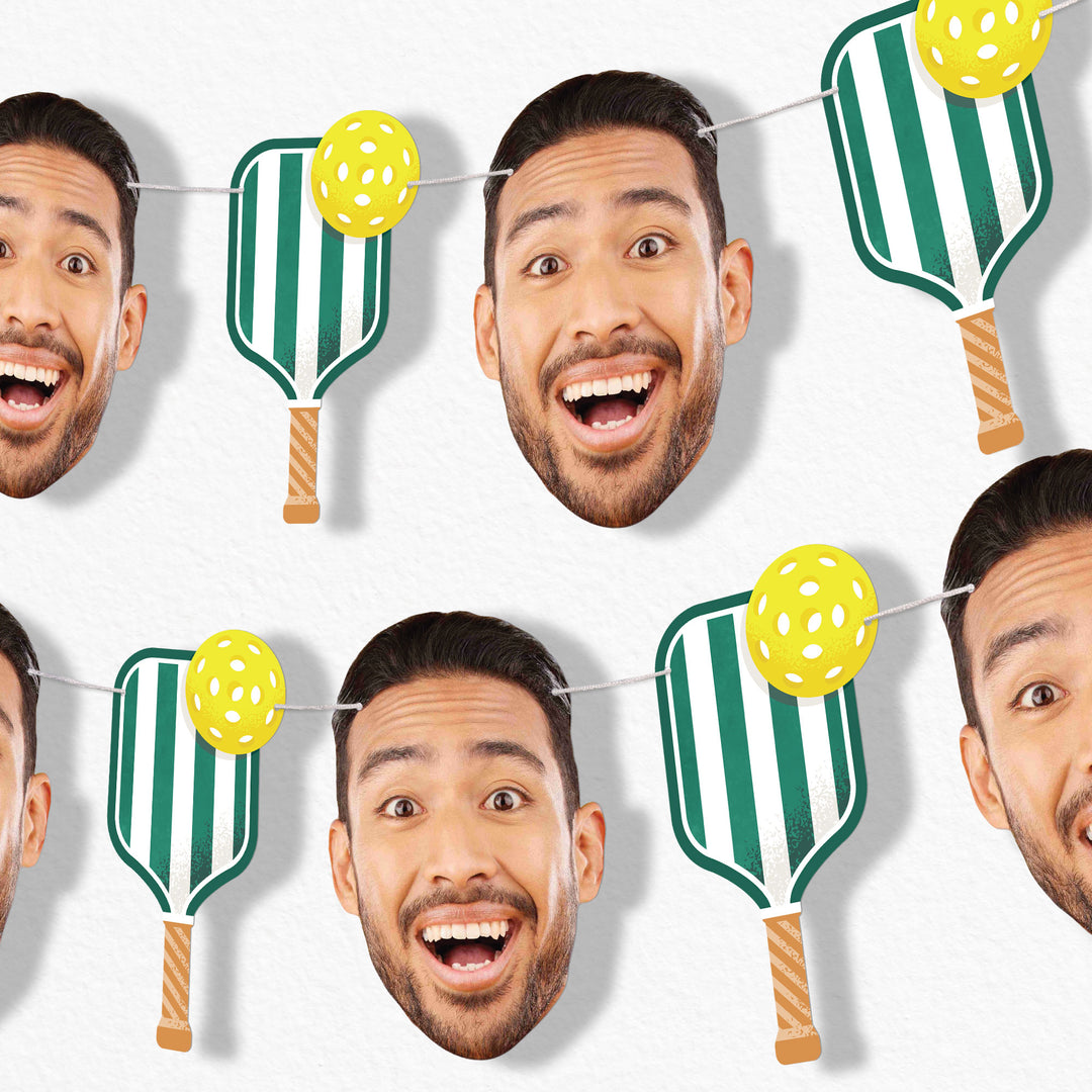 Custom Face Garland Banner surrounded by pickleball paddle decorations on a white background