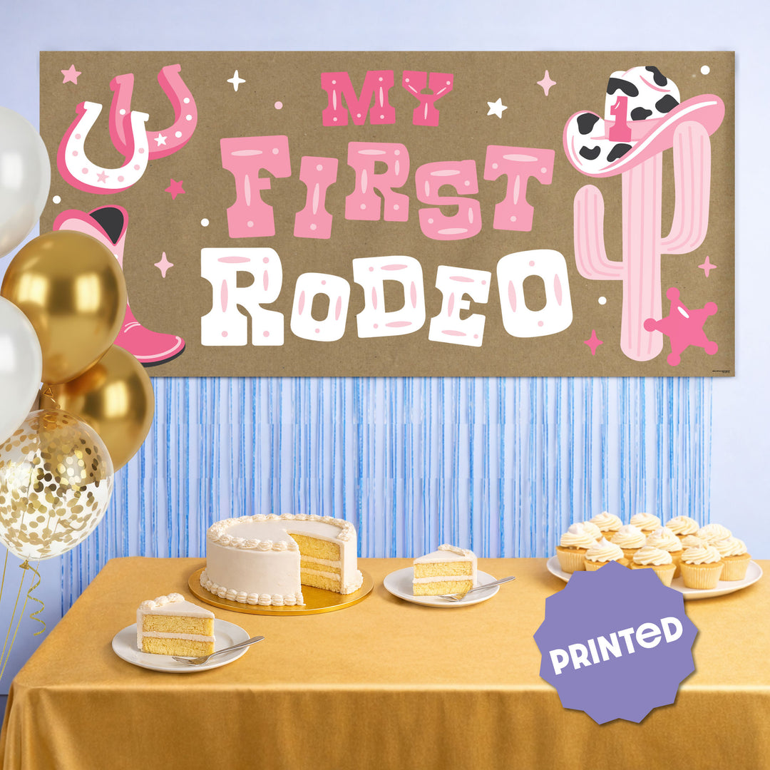 Cowgirl first birthday backdrop with pink boots