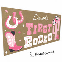 Pink cowgirl boots and cactus artwork close-up