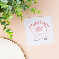 Pink custom name and year coaster close-up