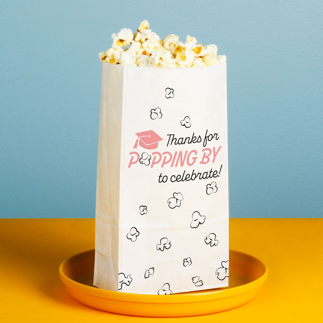 Pink graduation popcorn bag gusseted bottom detail