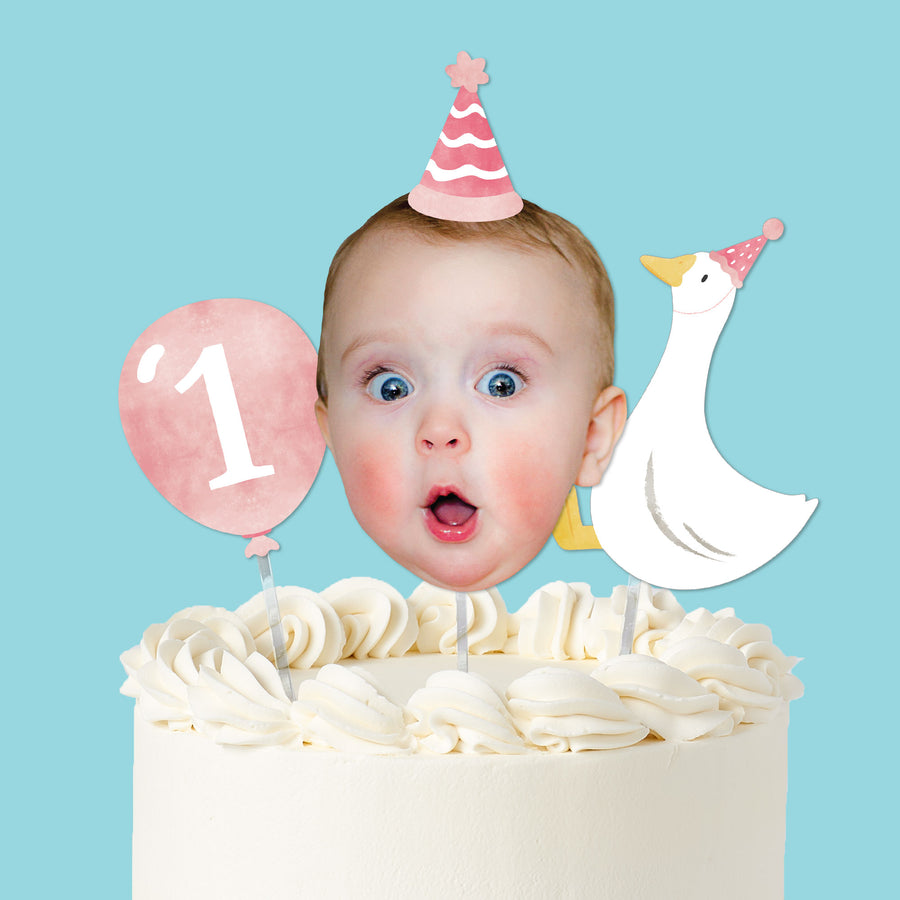 One Silly Goose pink cake topper with photo face balloon and goose