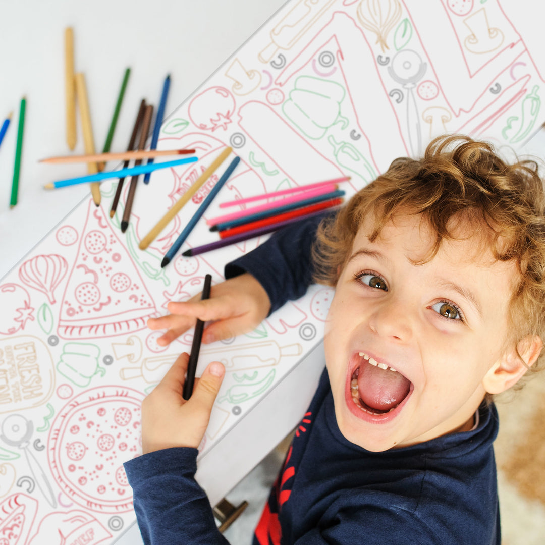 Kids coloring pizza party table runner at birthday party