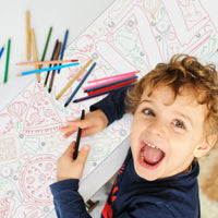 Kids coloring pizza party table runner at birthday party