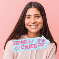 Guest using props at birthday photo booth