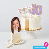 Personalized cake topper on birthday cake display