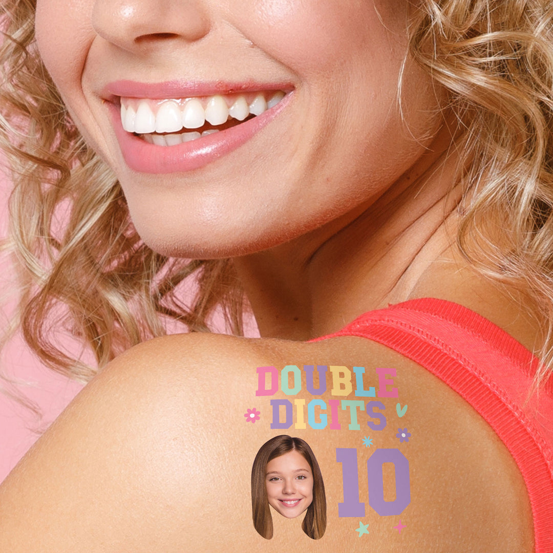 Guest wearing personalized tattoo at birthday party