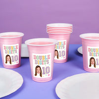 Party cups styled on girls birthday drink table