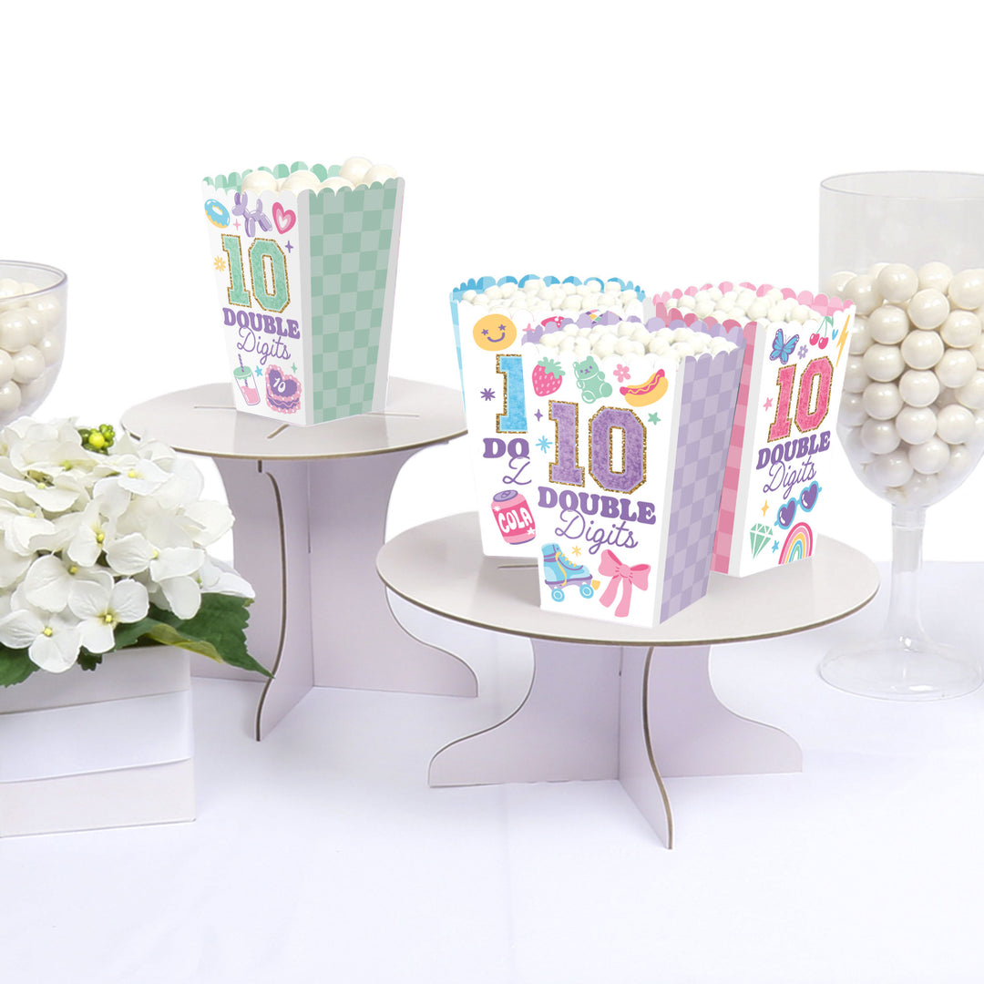 Popcorn boxes styled on girls 10th birthday snack table