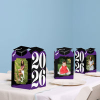Purple graduation table decor with photo centerpieces